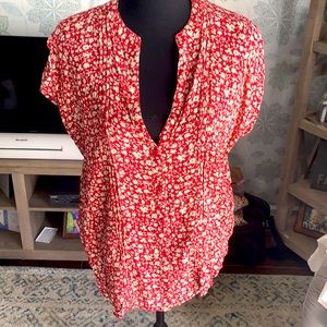Cap sleeve floral print blouse.  Size large.  Red and cream